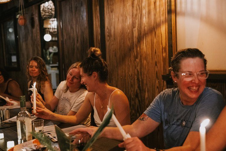 A candid moment of sisterhood at the Ember and Solis women's retreat