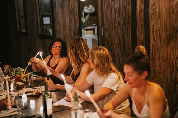 Women dancing and celebrating together at the Vieques retreat