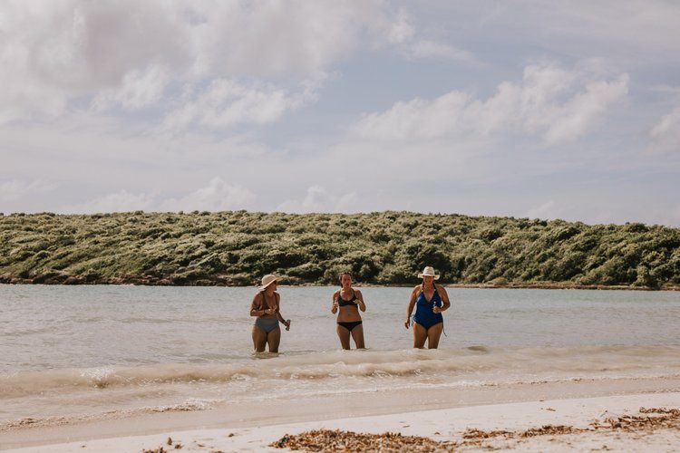 Sunrise yoga session at the women's retreat in Vieques, Puerto Rico, photographed by Lindsey O