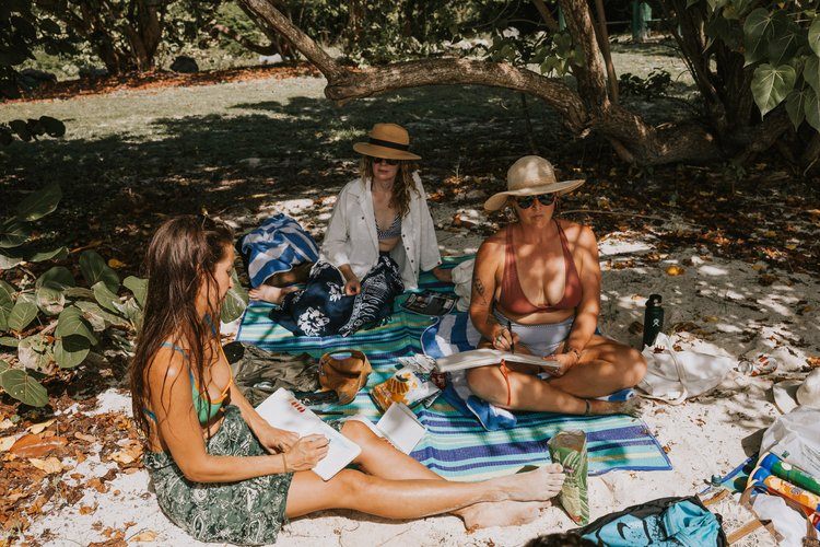 Women's circle gathering during the Ember and Solis retreat in Vieques