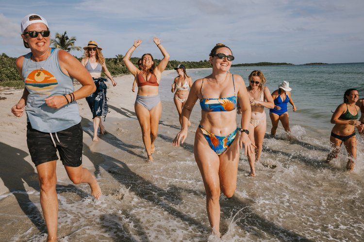 Women dancing and celebrating together at the Vieques retreat