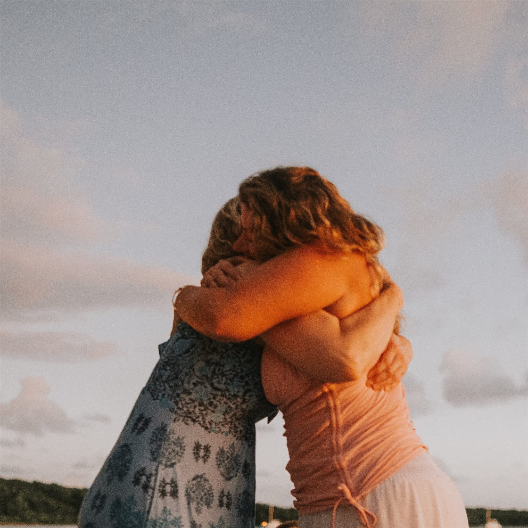 A candid moment of sisterhood at the Ember and Solis women's retreat