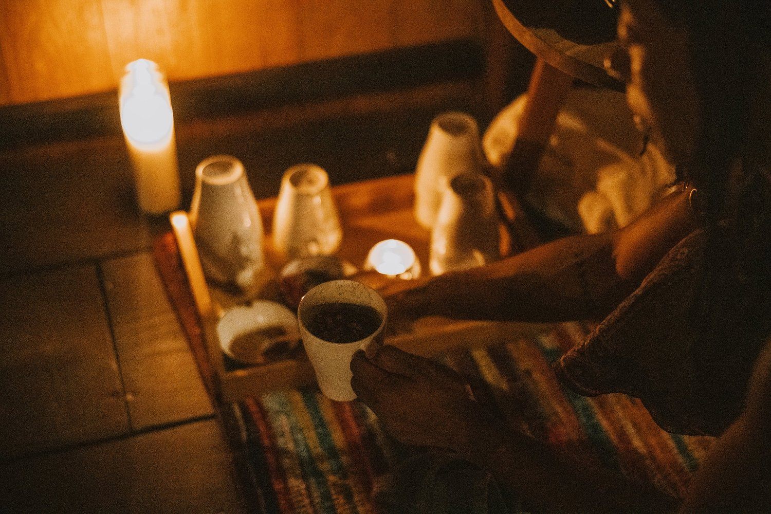 Retreat guests connecting and sharing stories in a women's circle