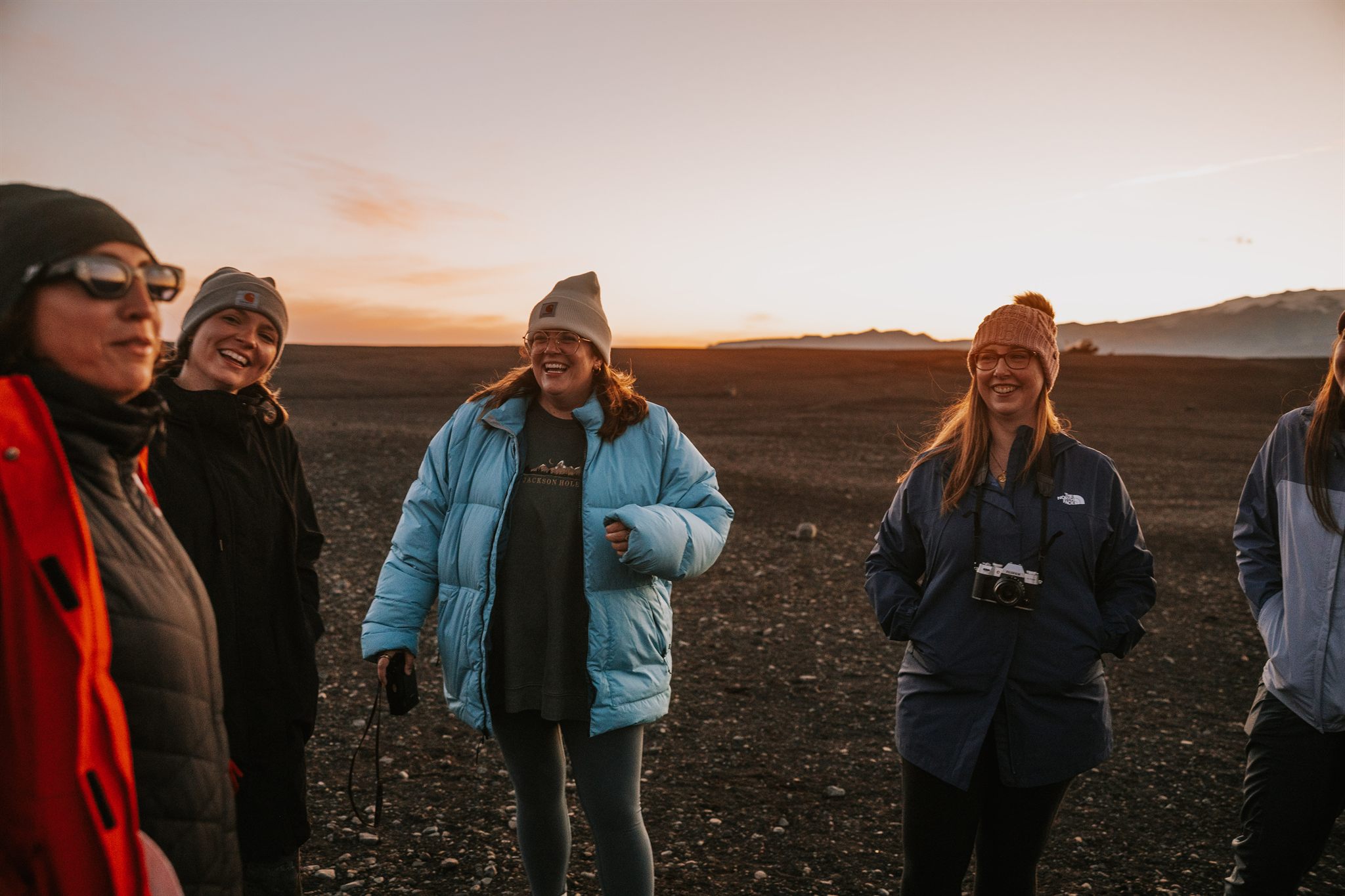 Women gathered outdoors on the Iceland summer retreat