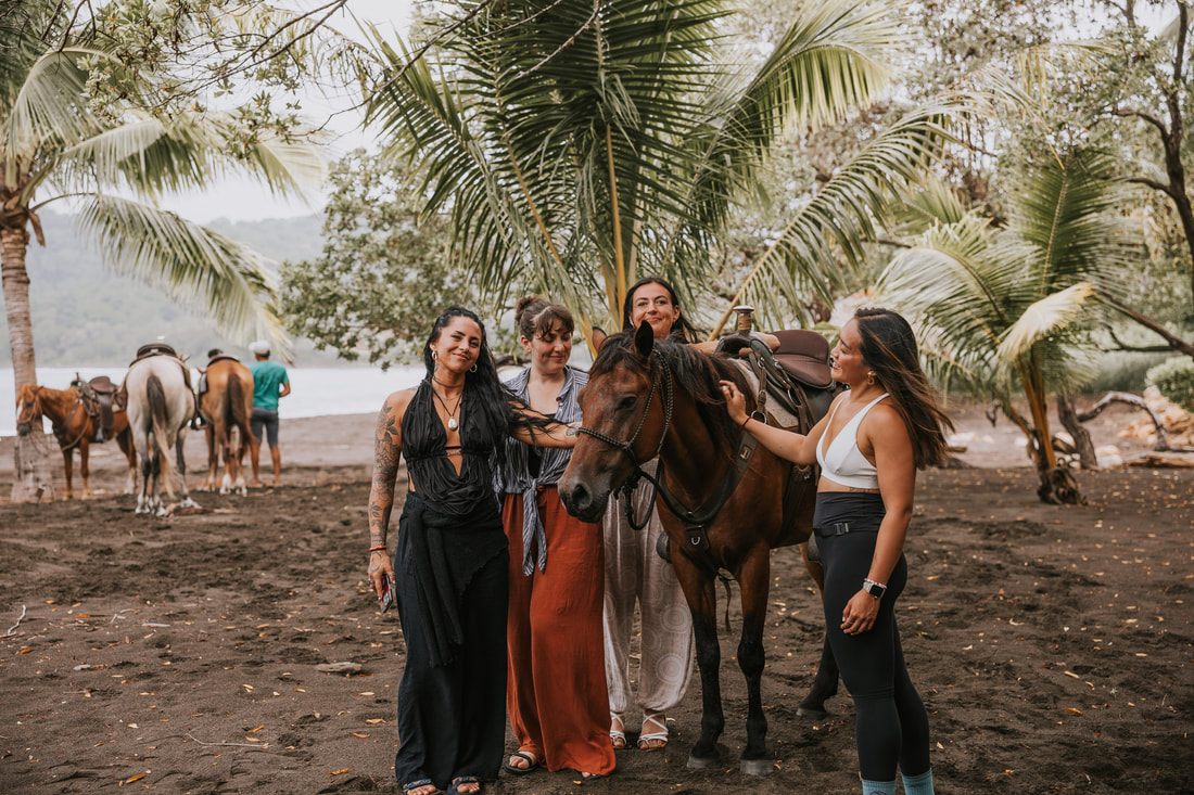 Women gathered in a circle sharing stories at the retreat