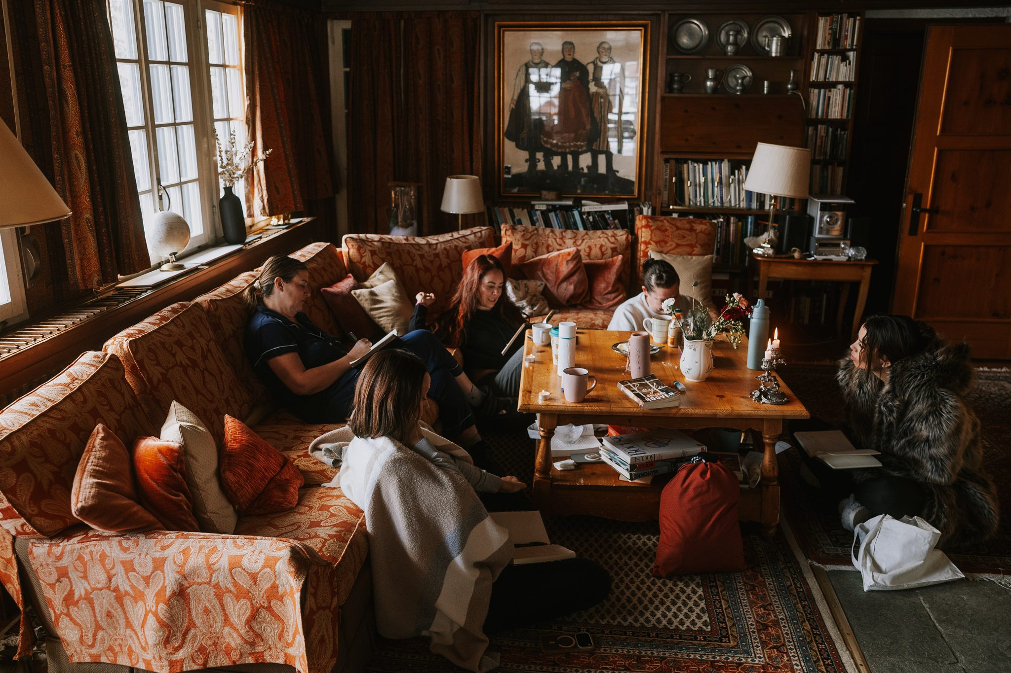 Women writing and creating together at a Zermatt retreat