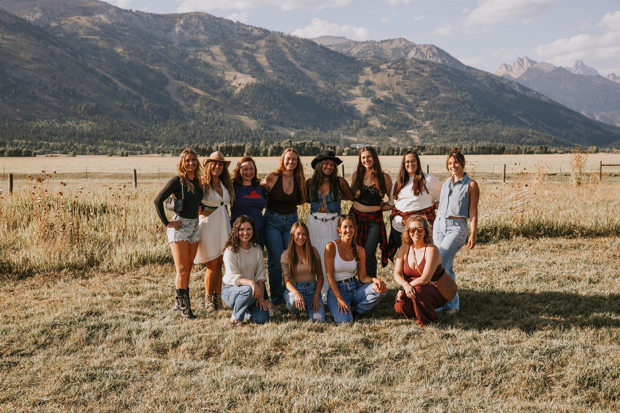 Grand Tetons women's retreat group riding horseback through the valley